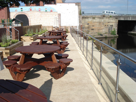 picnic area with stainless steel handrail and glass balustrade system