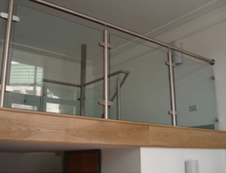stainless steel handrail and posts with glass infill panels