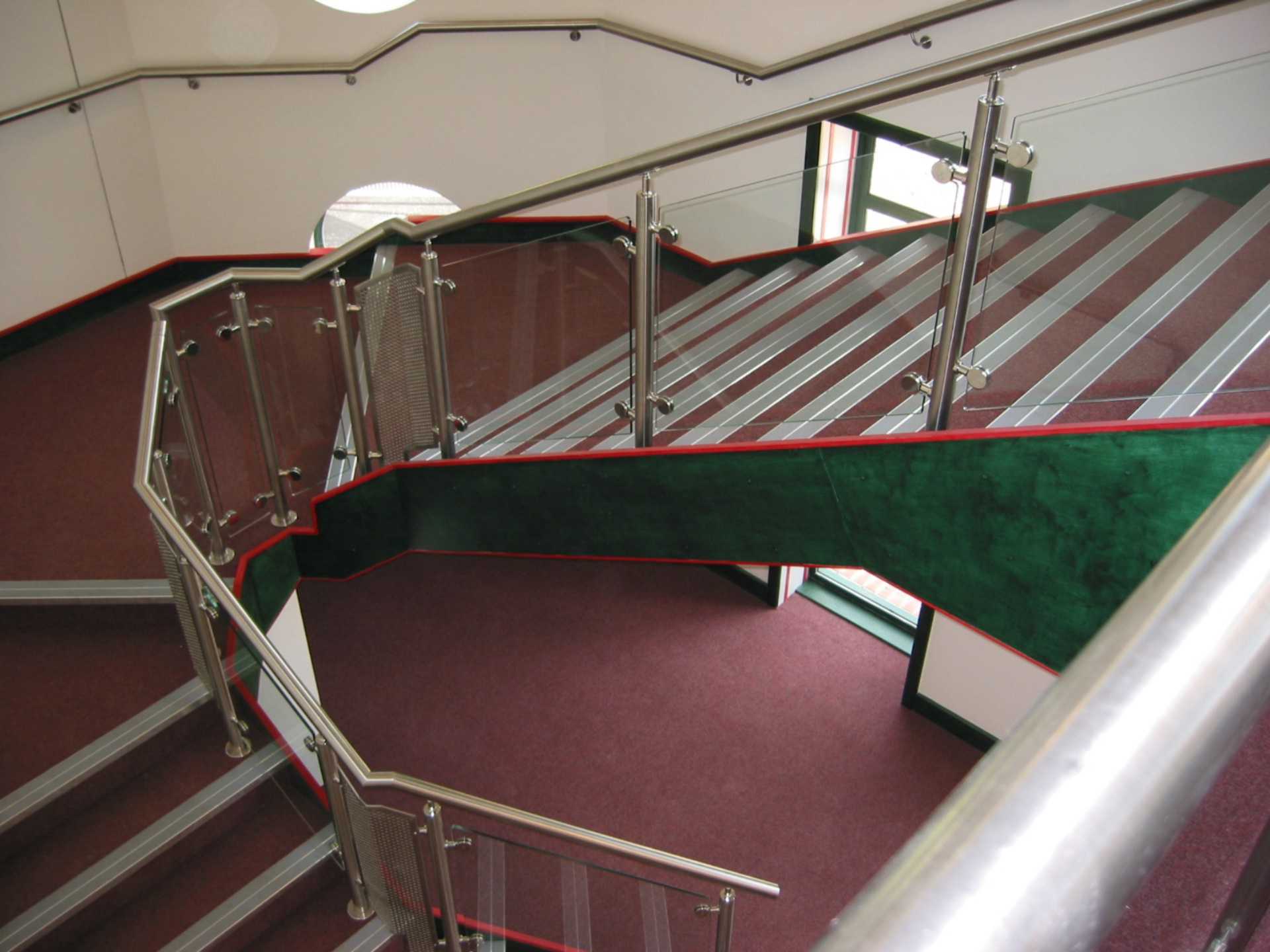 stainless steel handrail with glass infill panels