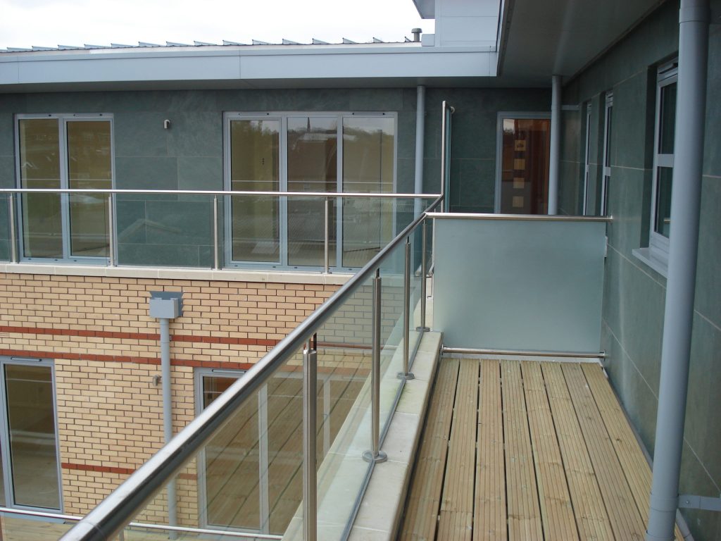 Glass balustrade on apartment balcony