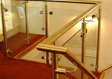 Brass Handrail with glass balustrade