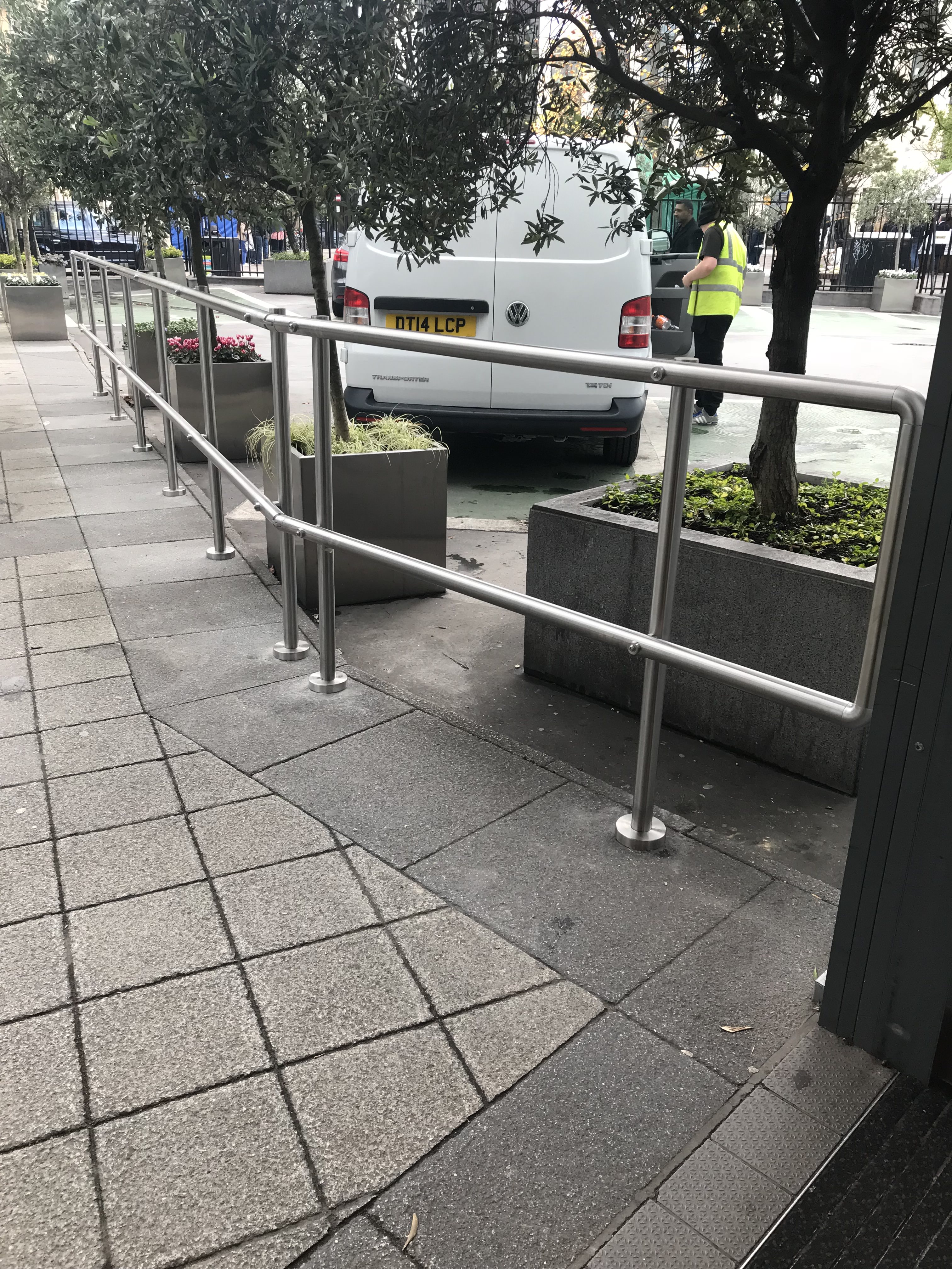 exterior handrail created barrier on carpark