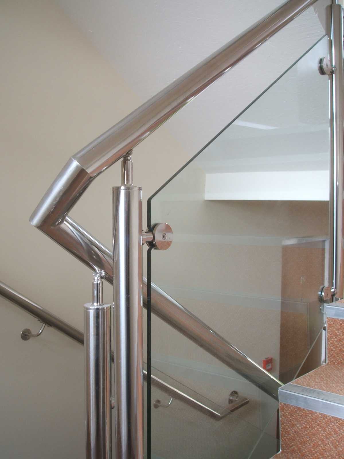 angular stainless steel handrail with glass infill