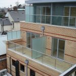 Glass balustrade with stainless steel handrail