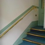 Wall mounted brass handrail