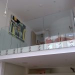 Glass balustrade on mezzanine