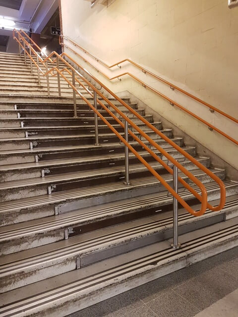 handrails on railway station steps