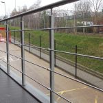 External stainless steel handrail with wire infill