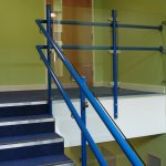 Internal blue handrail in School