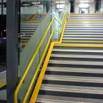 Railway Station staircase with yellow Handrail