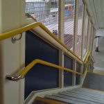 Footbridge handrail at railway station