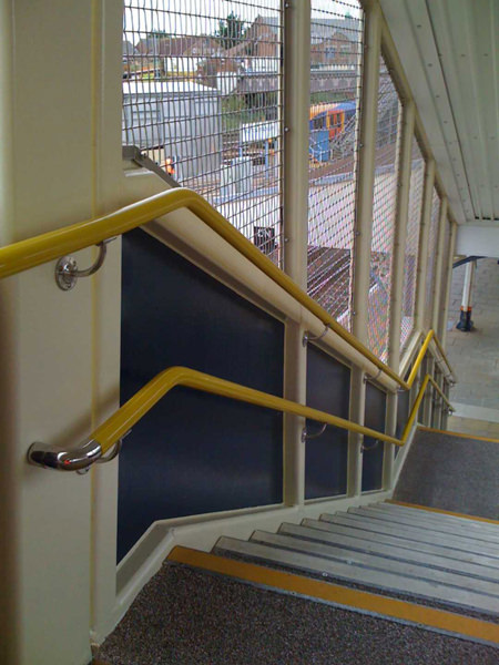 Footbridge handrail at railway station