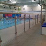 Glazed balustrade at public swimming pool