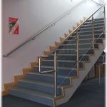 Stainless steel handrail up school staircase