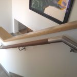 Stainless steel handrail on house staircase